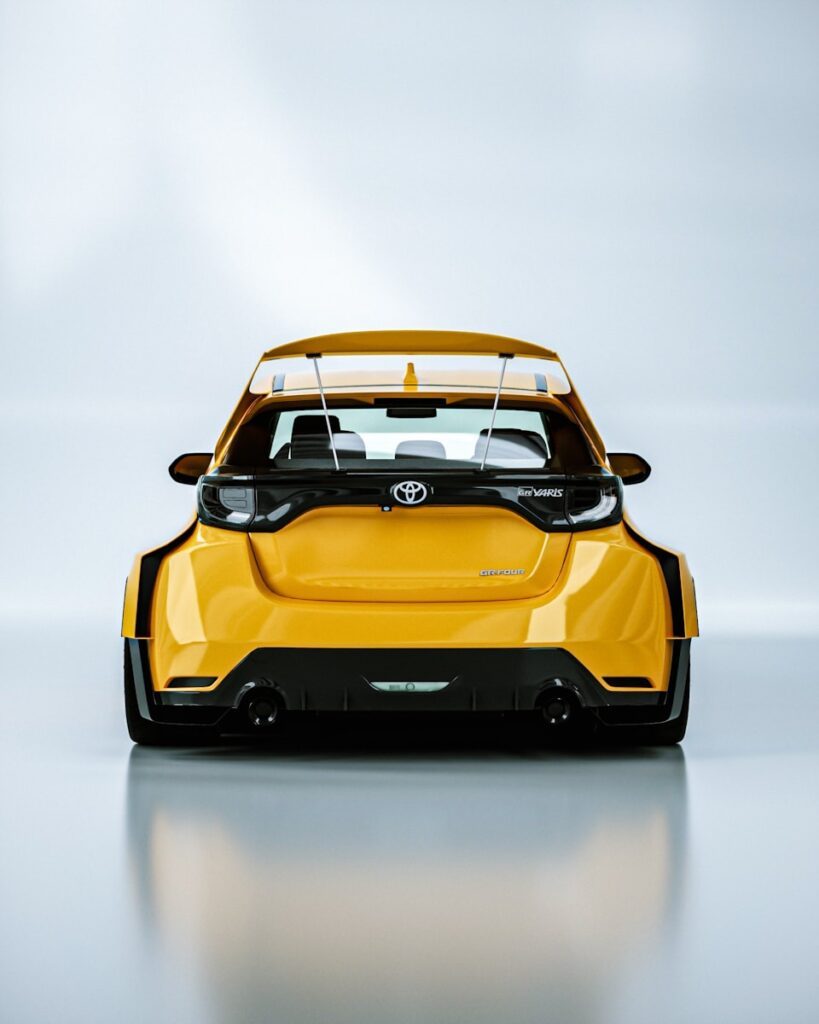 A sporty yellow toyota car is seen.